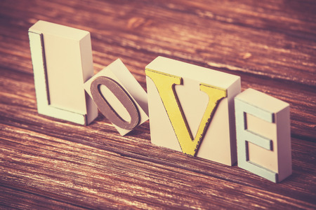 Word love on wooden table.の写真素材