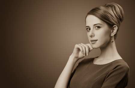 Portrait of a beautiful women. Photo in old sepia image style.の写真素材