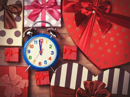 Vintage clock on christmas backgroundの写真素材