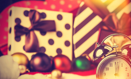 Vintage clock on christmas backgroundの写真素材