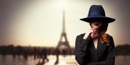 Style women in hat and parisian backgroundの写真素材