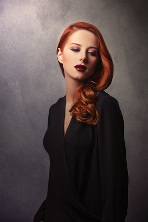 Portrait of fashion redhead womenの写真素材