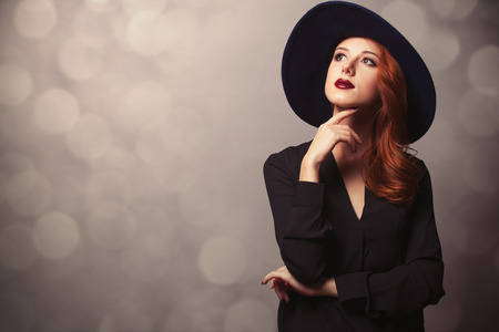 Style redhead women in black on classic backgroundの写真素材