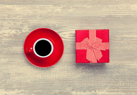 Cup of coffee and gift boxの写真素材