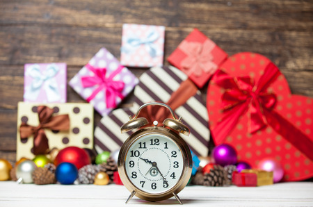 Clock and Christmas toys.