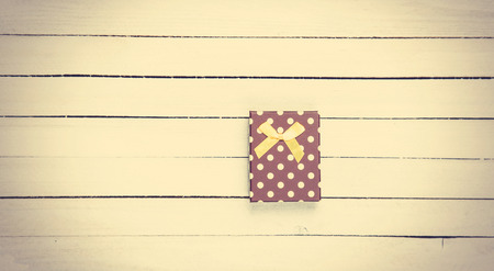 Pink box on a wooden table.の写真素材