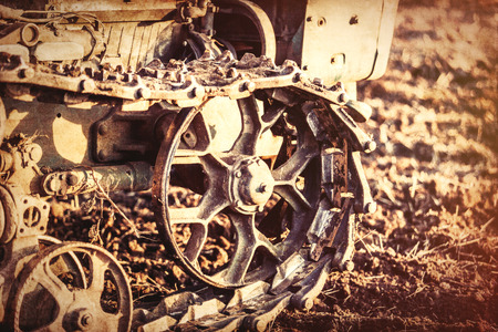 Old tractor mechanisms. Photo in old color image style,の写真素材