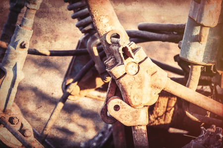 Old tractor mechanisms. Photo in old color image style,の写真素材