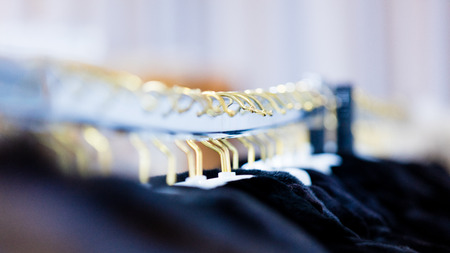 photo of the beautiful fur coats on the hangers