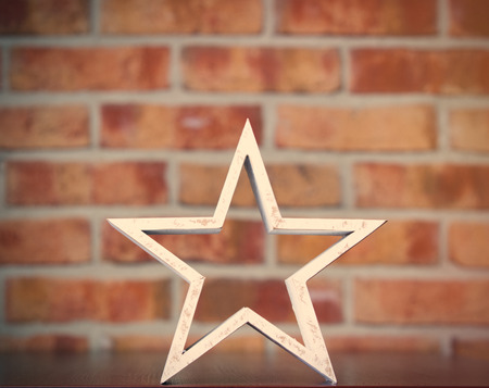 Star shape on brick wall backgroundの写真素材