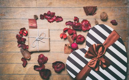 Vintage gift boxes and decoration on wooden backgroundの写真素材