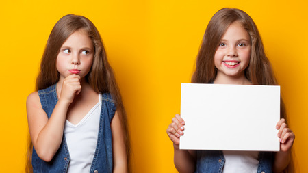 Young sad girl on yellow background.の写真素材