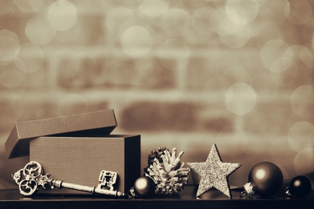 Christmas box and ribbon with star on brick ball backgroundの写真素材