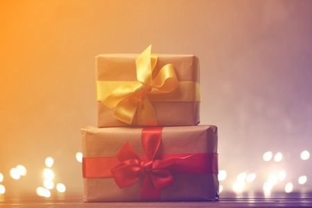 Little gift with Fairy Lights on background. Christmas or Halloween seasonの写真素材