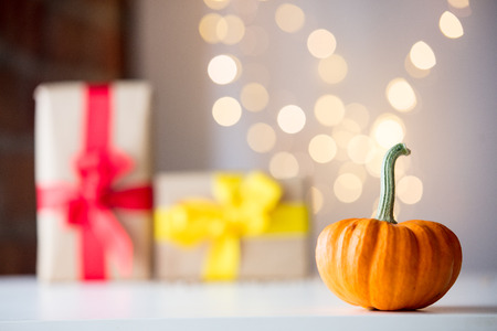 Pumpkin with Fairy Ligths and bokeh on backgroundの写真素材