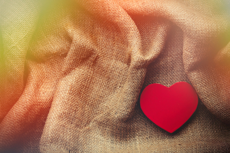 Heart shape box on jute background. St. Valentine's Dayの写真素材