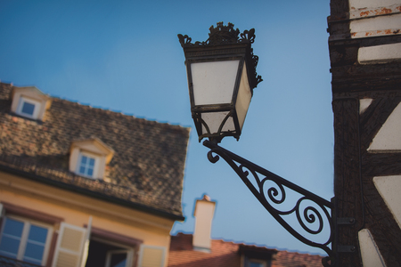 Vintage lamp on attached to the wall of the building. Strasburg, Franceの写真素材