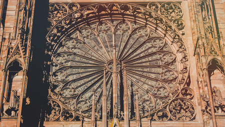 View at facade of old Cathedral in Strasburg, France. Image in old color styleの写真素材