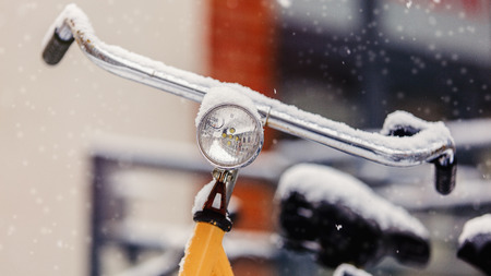 Beautiful style bike in snow after high snowfall in Europe. 