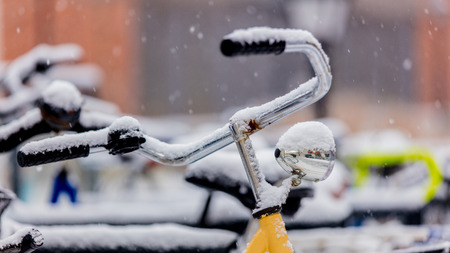 Beautiful style bike in snow after high snowfall in Europe. 