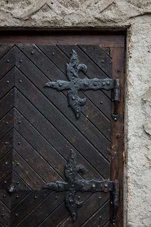 Part of old medieval door in European castleの写真素材