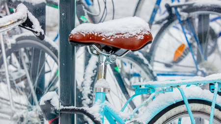 Beautiful style bike in snow after high snowfall in Europe.の写真素材