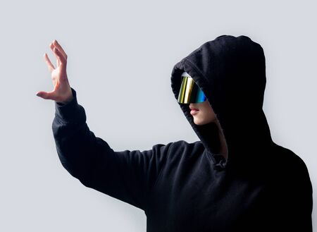 Style woman in concept VR glasses on white backgroundの写真素材