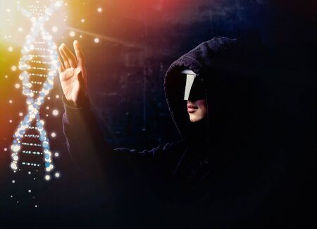 Person on concept VR glasses works with the human genome and DNAの写真素材