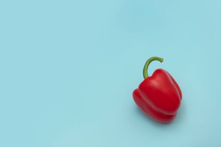 Red pepper on blue backgroundの写真素材