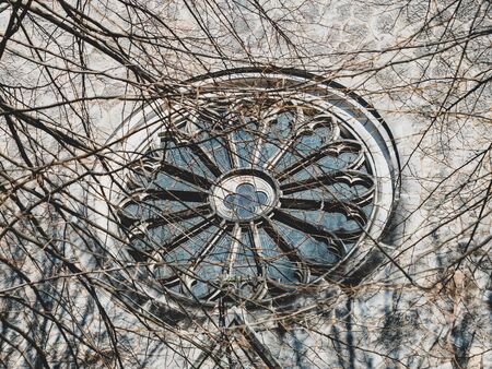 circular stained glass window in the Church of the late middle ages