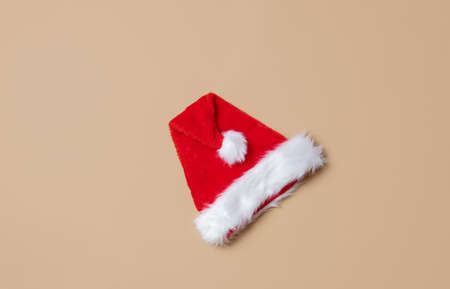 Red Santa Claus hat on stark white background. Above viewの写真素材