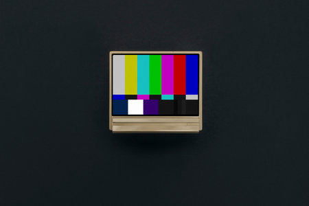 top view of a vintage CRT television with a color adjustment frame on the screen, showing the concept of retro media.の写真素材