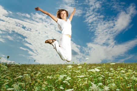 Beautiful girl in meadowの写真素材