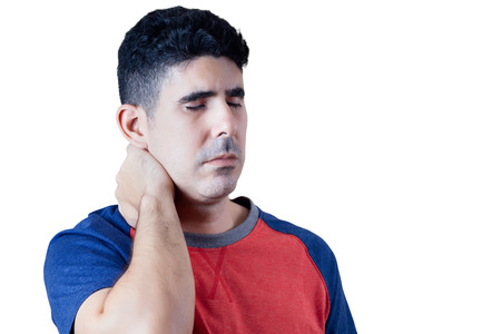 Latin man with persistent pain on the neck isolated on white