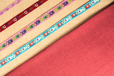 Two fabrics arranged diagonally with ornaments