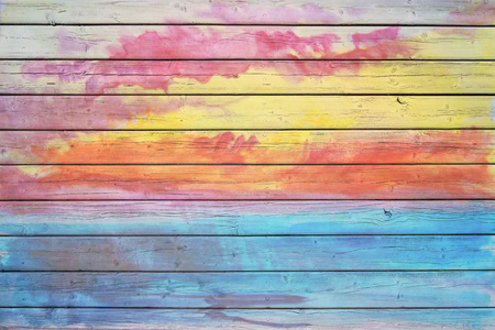 Texture smeared with colored paint wooden wall of the old houseの写真素材
