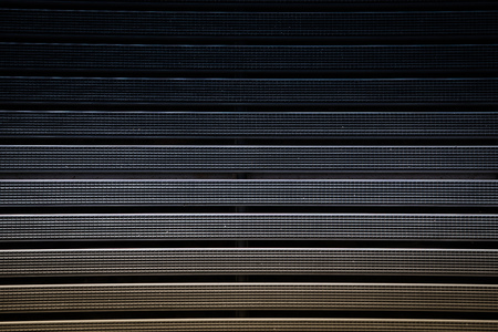 Metal grating with rubber textured multi-colored coating