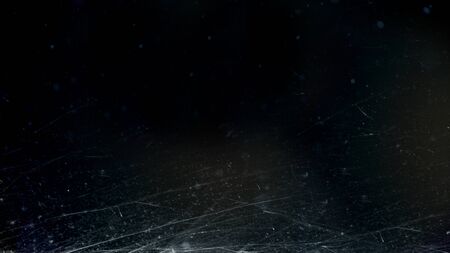 The metal matte surface is covered with scratchesの写真素材