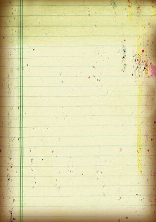 Torn from a notebook stained with colored paint sheet .Texture or backgroundの写真素材