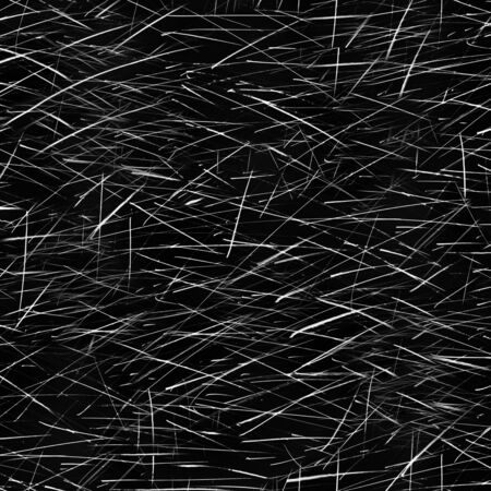 There are many sharp lines drawn on the black surface.Texture or background like a needleの写真素材