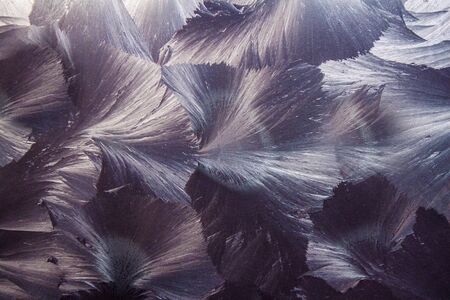 The pattern on the metal surface is bluish .Texture or background