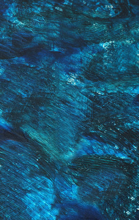 The uneven rough surface of the wall is blue.Texture or background