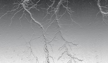 Abstract silver metallic texture with cracking pattern