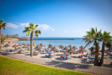 TENERIFE, SPAIN-SEPTEMBER 17:Beach Playa de la Vistas  on September 17, 2011. Tenerife,Spain. More than 5 million tourists from UK visit Tenerife every year.のeditorial素材