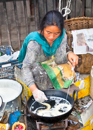 KATHMANDU, NEPAL - MAY 19: Unidentified vendor sold traditional food at Kathmandu street  on May 19, 2013 in Nepal. のeditorial素材