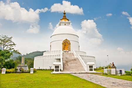 World peace pagoda in Pokhara Nepal. Designed to help unite people their search for world peace. Most pagodas built since World War II under the guidance of Nichidatsu Fuji, a Buddhist monk from Japan.の写真素材