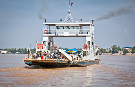 NEAK LEUNG, CAMBODIA - NOV 19, 2013: Ferry across the Mekong on Nov 19, 2013, in Neak Leung, Cambodia. Kingdom of Cambodia is a country located in Southeast Asia. Population of over 14.8 million.のeditorial素材
