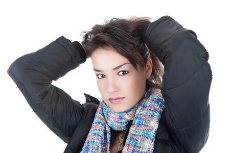 Portait beautiful young woman with long dark hair. On white backgroundの写真素材
