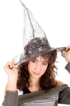 Beautiful young woman wearing santas hat on white backgroundの写真素材