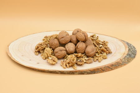 walnut on wooden billetの写真素材